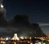 smoke rises over azadi square following a strike amid the us israeli conflict with iran in tehran on april 6 photo reuters