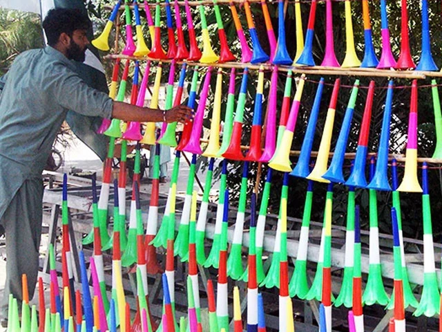 vendor displays colorful plastic horns in connection with independence day in rawalpindi on august 13 2022 photo online