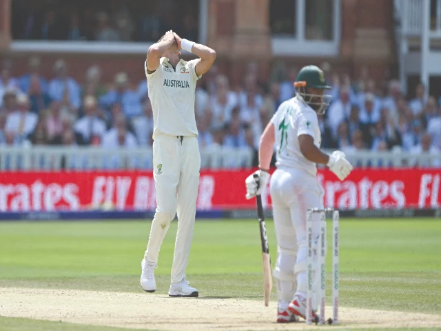 australia s mitchell starc reacts as south african skipper temba bavuma s catch is dropped by steven smith not in picture off his bowling during the icc wtc final on friday photo afp