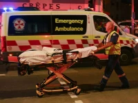 a wounded man is stretchered to hospital after the bondi beach shootings photo afp a wounded man is stretchered to hospital after the bondi beach shootings photo afp