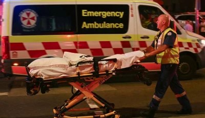 a wounded man is stretchered to hospital after the bondi beach shootings photo afp a wounded man is stretchered to hospital after the bondi beach shootings photo afp