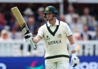 australia s steve smith celebrates after reaching his half century photo reuters