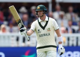 australia s steve smith celebrates after reaching his half century photo reuters