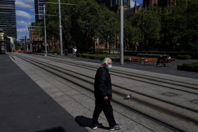 australia hits vaccine milestone as melbourne cases hover near record levels australia hits vaccine milestone as melbourne cases hover near record levels