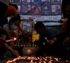 mourners in kathmandu lit candles before the portraits of mountaineer nirmal purja and his companions who were killed in an avalanche in pakistan photo afp file