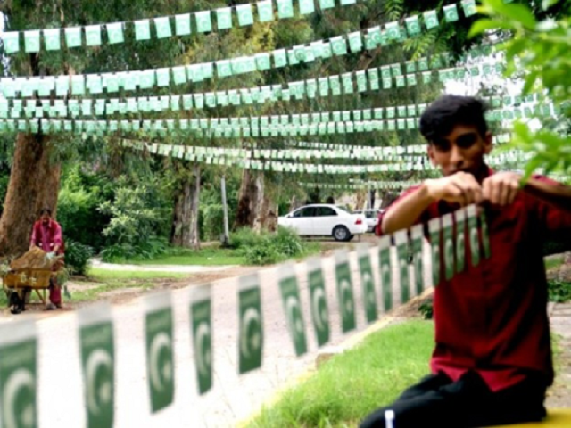 a citizen adorning the streets with buntings photo file