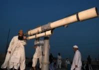 ruet e hilal committee chairperson maulana muhammad abdul khabeer azad looks through telescope for the new moon photo afp