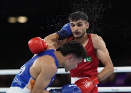 sumama rahman pakistan s solid boxer fights against jadumani singh of india in the 55 kilogramme bout at the 2026 glasgow commonwealth games sumama loses 5 0 photo afp