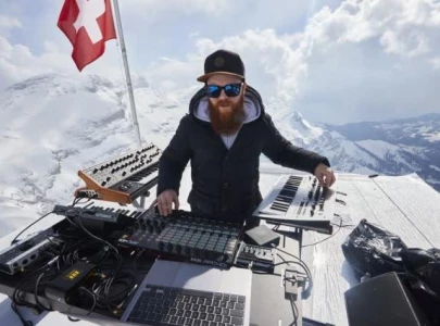 french techno musician rocks swiss mountain tops