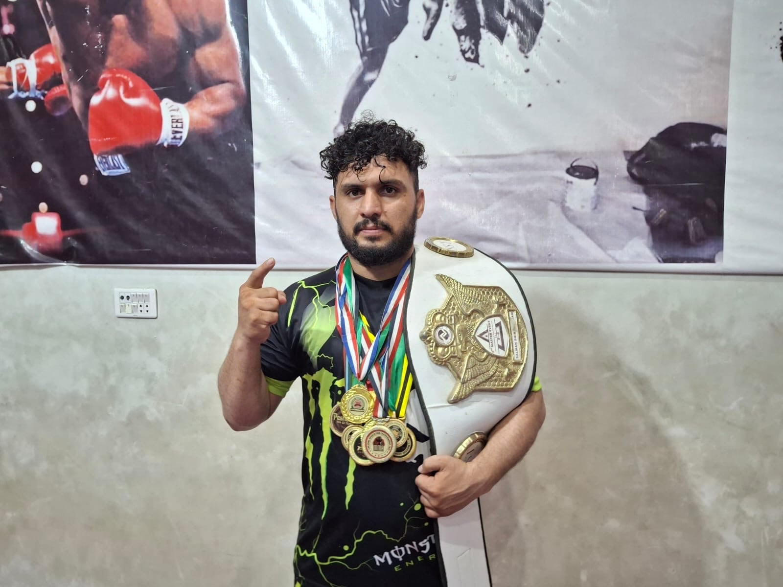 Peshawar taxi driver and fellow coach sustain MMA training with little official support