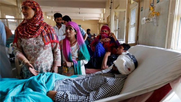 A man injured by a pellet gun lies in a Kashmir hospital. PHOTO: REUTERS