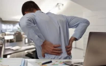 desk job got your back hurting how to protect your spine during long work hours