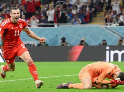 wales snatch us draw on world cup return