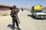 a police officer stands guard along a road leading to the border crossing along the pakistan afghanistan in balochistan province in chaman on february 27 2026 photo reuters