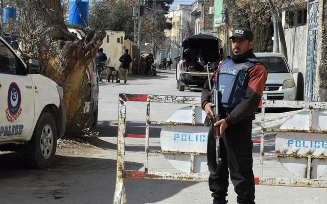 a policeman stands guard outside the provincial election commission office in quetta on february 5 2024 photo afp