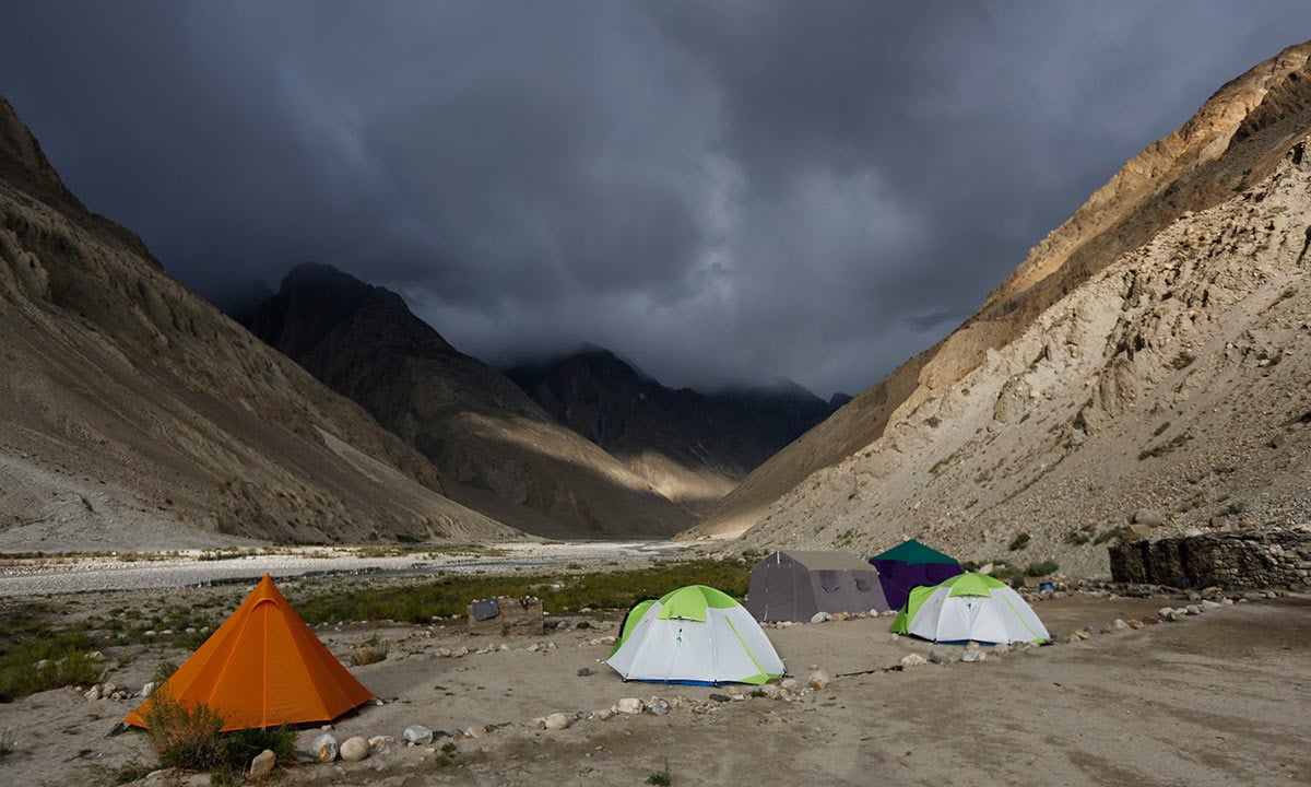 tents stand under dark rain clouds in the valley of the river braldu at bardoumal near the baltoro glacier in the karakoram mountain range  reuters photo shukrullah baig a 52 year old brick layer and former cook at a five star hotel chain cooks a chapati in the village of askole in the karakoram mountain range in pakistan photo reuters