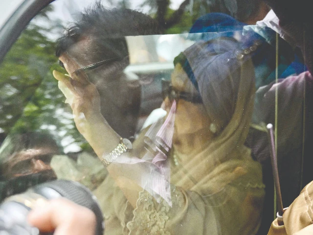 bnp s khaleda zia gestures upon her arrival in dhaka photo afp