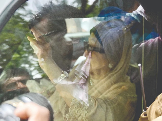 bnp s khaleda zia gestures upon her arrival in dhaka photo afp bnp s khaleda zia gestures upon her arrival in dhaka photo afp
