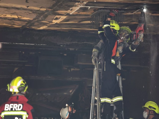 members of the emergency response team inspect the ceiling of rong beer na lat phrao bar at the site of a deadly fire in bangkok thailand july 14 2026 photo reuters members of the emergency response team inspect the ceiling of rong beer na lat phrao bar at the site of a deadly fire in bangkok thailand july 14 2026 photo reuters