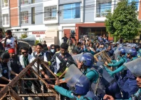 bangladeshi police try to stop demonstrators as they march towards the assistant indian high commissioner office in rajshahi on december 18 photo afp