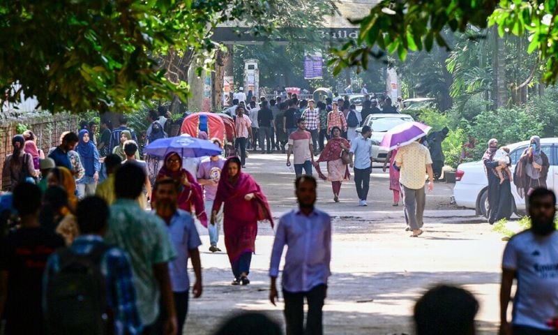 students gather at the dhaka university campus in dhaka on september 22 2024 students returned to classes at bangladesh s dhaka university on september 22 after a weeks long shutdown sparked by a student led uprising that toppled autocratic prime minister sheikh hasina photo afp