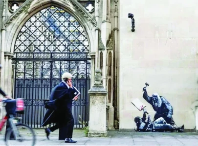 banksy s mural strikes a blow at the law banksy s mural strikes a blow at the law