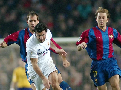 hurting barca bid to slow madrid s title charge in clasico