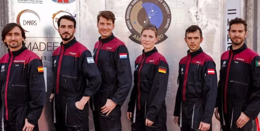 a team of six astronauts from l to r spain israel the netherlands germany austria and portugal pose for a group photo before starting a training mission for planet mars at a site that simulates an off site station at the ramon crater in mitzpe ramon in israel s southern negev desert on october 10 2021 photo afp a team of six astronauts from l to r spain israel the netherlands germany austria and portugal pose for a group photo before starting a training mission for planet mars at a site that simulates an off site station at the ramon crater in mitzpe ramon in israel s southern negev desert on october 10 2021 photo afp