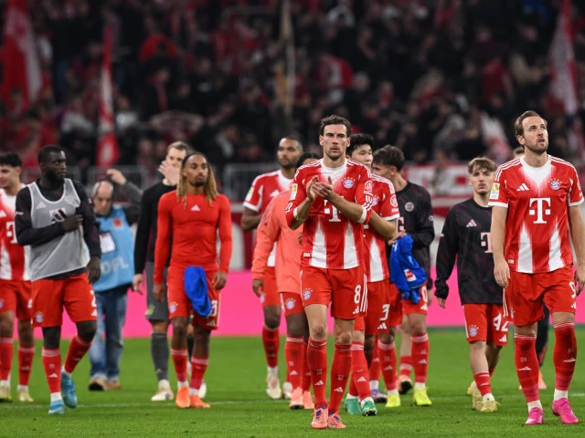 bayern munich s leon goretzka and harry kane applaud their fans after the match on november 1 photo reuters