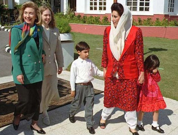 First lady Hillary Rodham Clinton, with her daughter Chelsea, left, walks with Pakistani Prime Minister Benazir Bhutto, holding hands with her son Bilawal and daughter Bakhtawar, March 26, 1995, in the garden of the prime minister's residence, in Islamabad. PHOTO: AP 