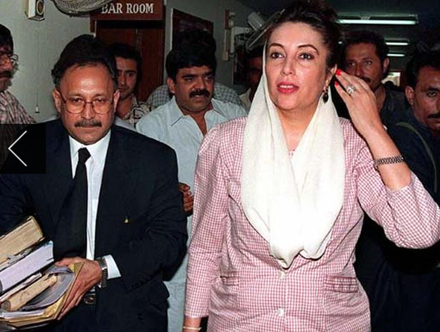 In this September 4, 1998, photo, former premier of Pakistan Benazir Bhutto, right, and her lawyer Farooq Naik leave the court building in Karachi after filing a petition challenging the decision of the Sindh High Court. Bhutto said at the time there had been progress in talks on a power-sharing deal with President Pervez Musharraf and that she was ready to meet him face-to-face. PHOTO: AFP 