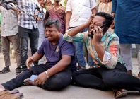men mourn the death of their relatives outside a hospital morgue following an earthquake in dhaka bangladesh photo reuters