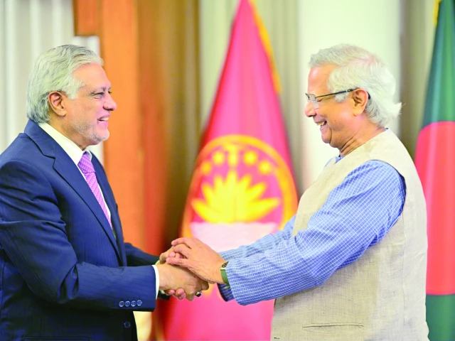 bangladesh chief adviser muhammad yunus welcomes deputy pm ishaq dar before their meeting in dhaka photo express x foreignofficepk