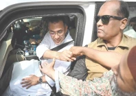 bnp chairman tarique rahman greets his supporters as leaves his residence in dhaka photo afp