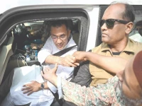 bnp chairman tarique rahman greets his supporters as leaves his residence in dhaka photo afp bnp chairman tarique rahman greets his supporters as leaves his residence in dhaka photo afp