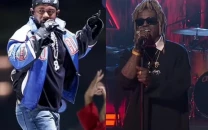 lil wayne performs medley of hits at snl50 with the roots as fans reignite super bowl debate lil wayne performs medley of hits at snl50 with the roots as fans reignite super bowl debate