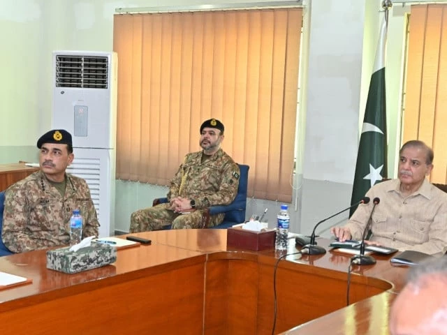 pm shehbaz coas during briefing on the ongoing rescue and relief operations in k p on august 20 photo pid
