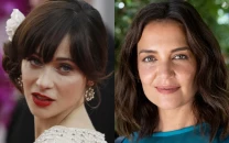 zooey deschanel reveals she nearly lost her iconic elf role to katie holmes