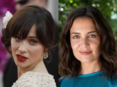 zooey deschanel reveals she nearly lost her iconic elf role to katie holmes