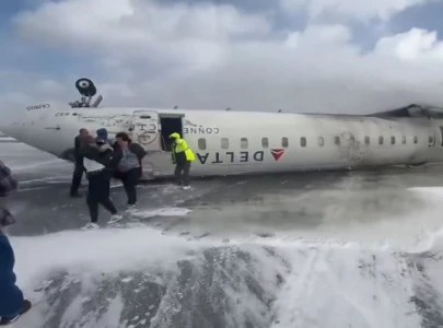 delta flight flips upside down in toronto experts weigh in as internet reacts it feels unsafe to fly in trump s america
