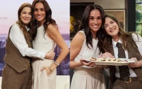 meghan markle s awkward interaction with drew barrymore analyzed by body language expert