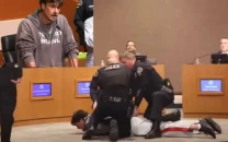 ex nfl punter chris kluwe arrested at city council meeting after calling maga a nazi movement ex nfl punter chris kluwe arrested at city council meeting after calling maga a nazi movement