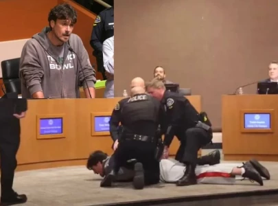 ex nfl punter chris kluwe arrested at city council meeting after calling maga a nazi movement ex nfl punter chris kluwe arrested at city council meeting after calling maga a nazi movement