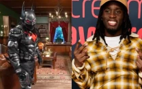 kai cenat transforms stream into wayne manor with custom batsuit for batman arkham finale