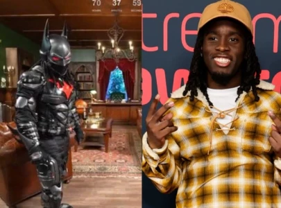 kai cenat transforms stream into wayne manor with custom batsuit for batman arkham finale