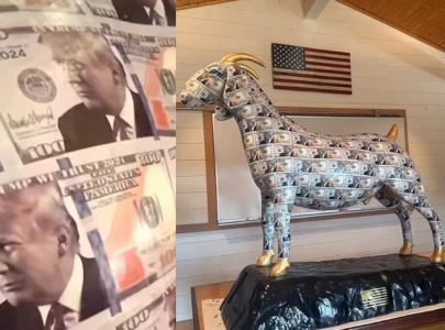 trump themed goat statue at mar a lago sparks christian outrage over in trump we trust message trump themed goat statue at mar a lago sparks christian outrage over in trump we trust message