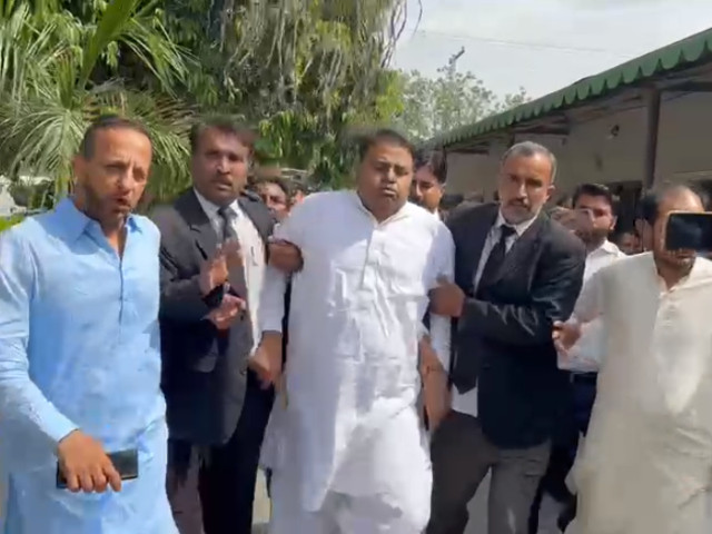 fawad chaudhry falls at ihc premises while making his way to his vehicle attempting to avoid his arrest