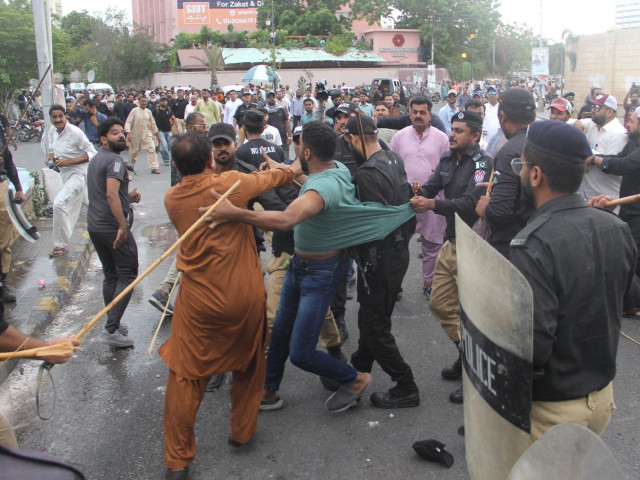 fierce confrontation erupts as ppp and jamaat e islami supporters clash outside the arts council after the mayoral election in karachi photo inp