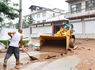 torrential rain displaces over 4 400 in beijing