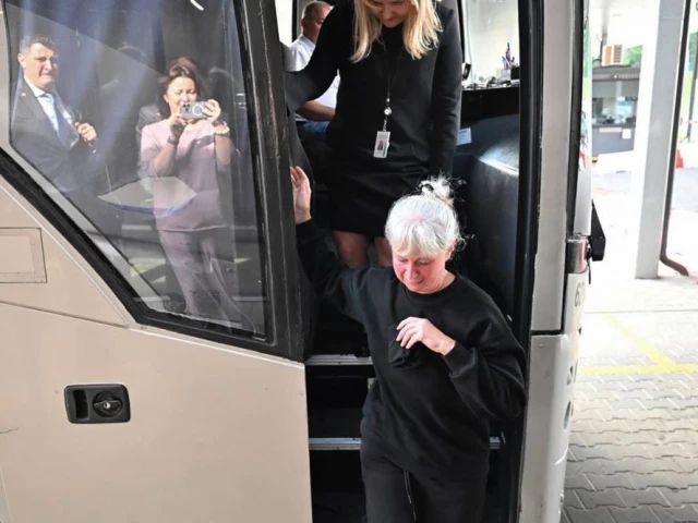 this handout taken and released on september 11 2025 by lithuania s foreign ministry shows lithuanian citizen elena ramanauskiene leaving a bus in lithuania at the border with belarus after her release along with other political prisoners photo afp this handout taken and released on september 11 2025 by lithuania s foreign ministry shows lithuanian citizen elena ramanauskiene leaving a bus in lithuania at the border with belarus after her release along with other political prisoners photo afp